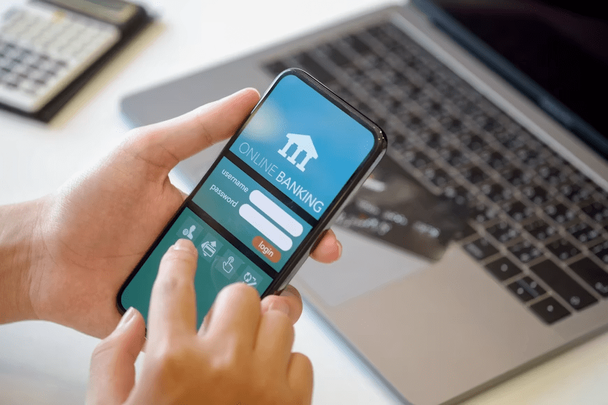 Person comparing currency exchange quotations on a mobile banking app before choosing the provider with the highest final amount of foreign currency. 