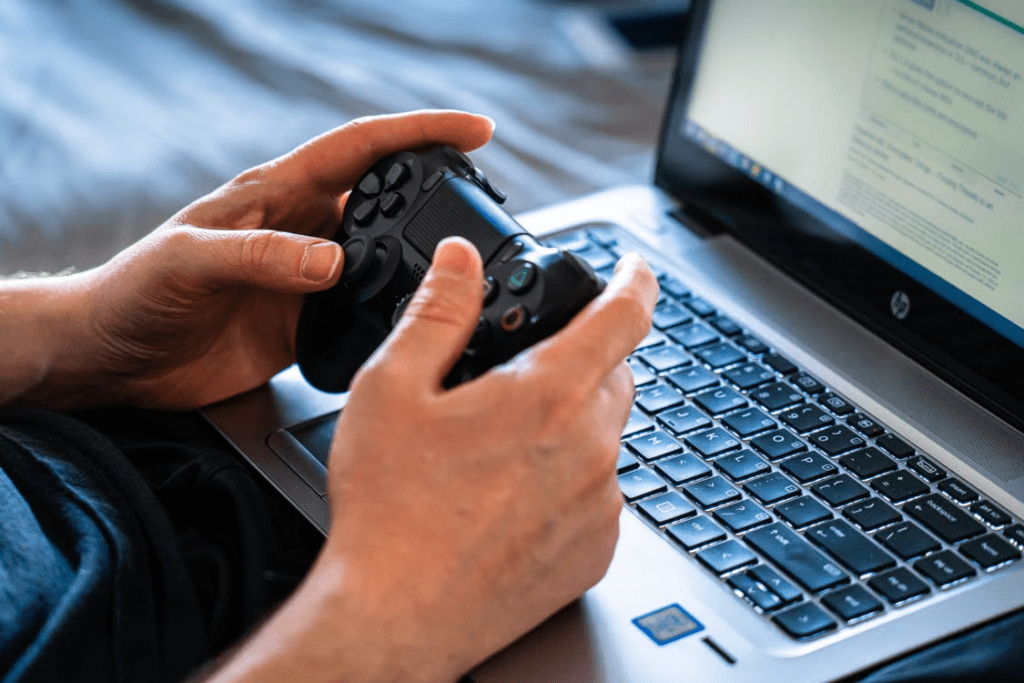 Gamer reading recent game reviews and player feedback before purchasing a full release title.